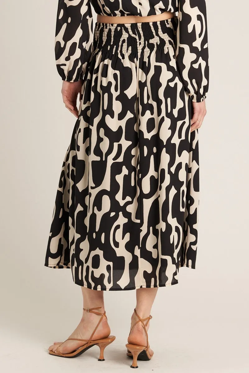 ABSTRACT PRINT SKIRT WITH SMOCKED WAIST