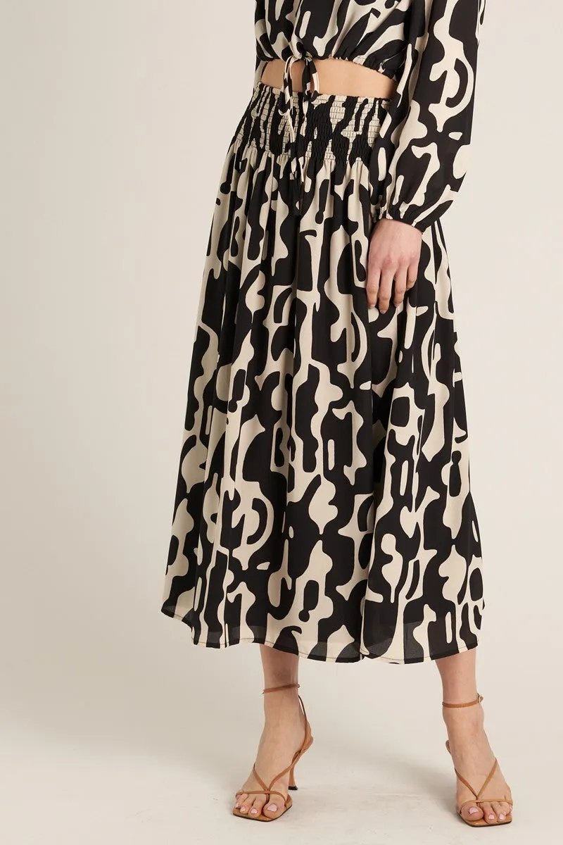 ABSTRACT PRINT SKIRT WITH SMOCKED WAIST